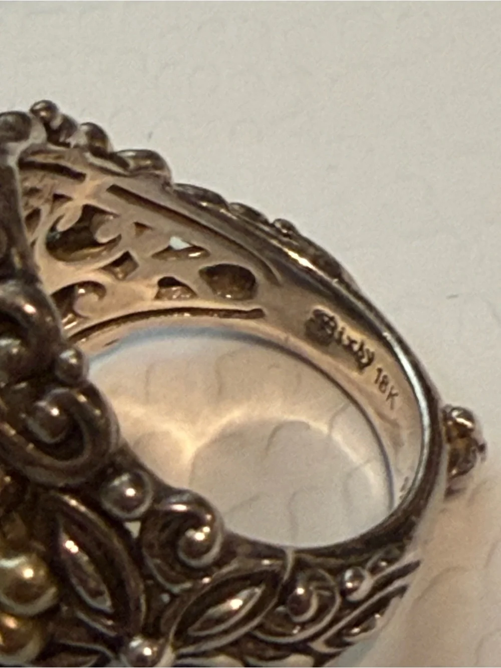 Barbara Bixby sterling and 18k yellow gold sky blue and white topaz ring.